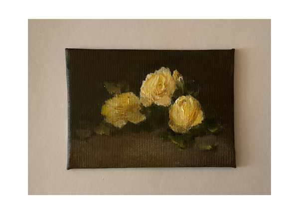 Miniature oil painting of yellow roses with a dark background.